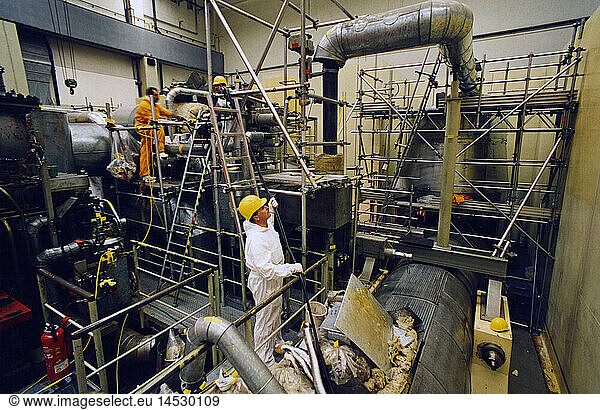 energy  nuclear power  nuclear power plant  Isar 1  Markt Essenbach  Lower Bavaria  Germany  interior view  revision of the low pressure turbine  1991  inspection  check  people  labour  working  technicians  technics  Ohu  electricity  1990s  90s  20th century  historic  historical
