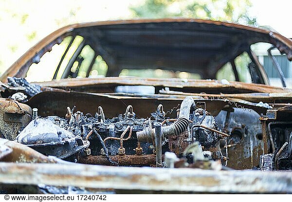 Engine compartment  burnt out car wreck  details  Germany  Europe