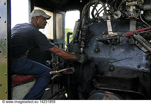 Engine-driver of steam locomotive  Havana  Cuba island  West Indies  Central America
