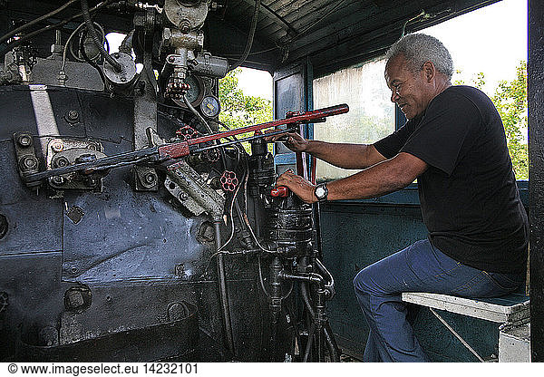 Engine-driver of steam locomotive  Havana  Cuba island  West Indies  Central America