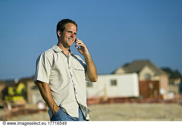 Engineer Talking On Cell Phone At A Construction Site  York Region  Ontario