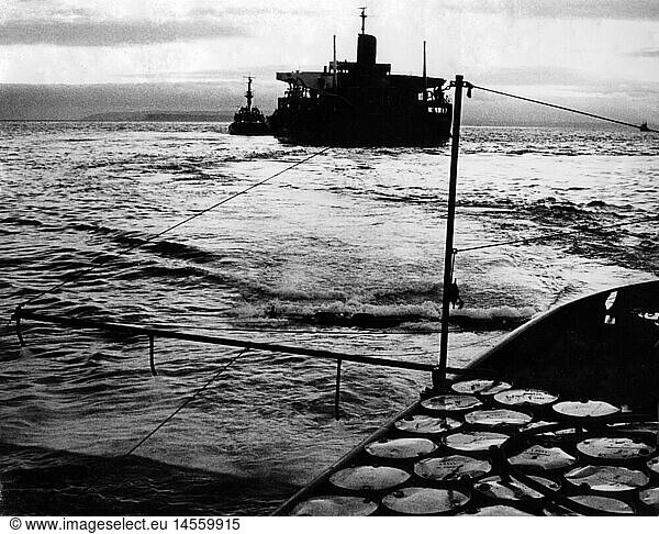 environment  environmental pollution  oil spill  fighting with chemicals against oil spill near Torbay coast  Great Britain  1960s  60s  20th century  historic  historical  ship  ships  sea  English channel coast