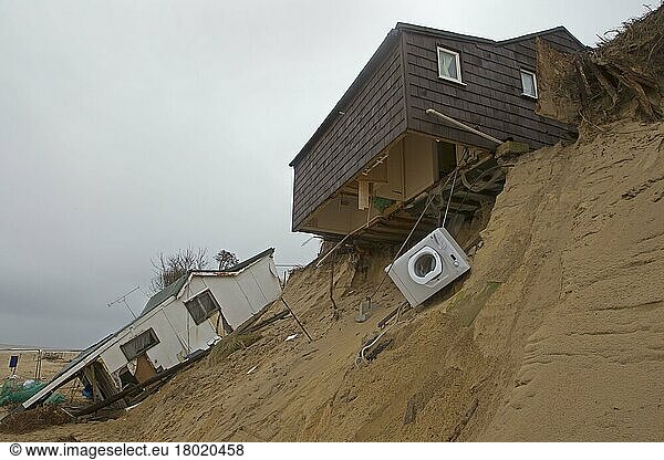 Eroded sea cliffs and damaged chalets after the December 2013 tsunami  Hemsby  Norfolk  England  United Kingdom  Europe
