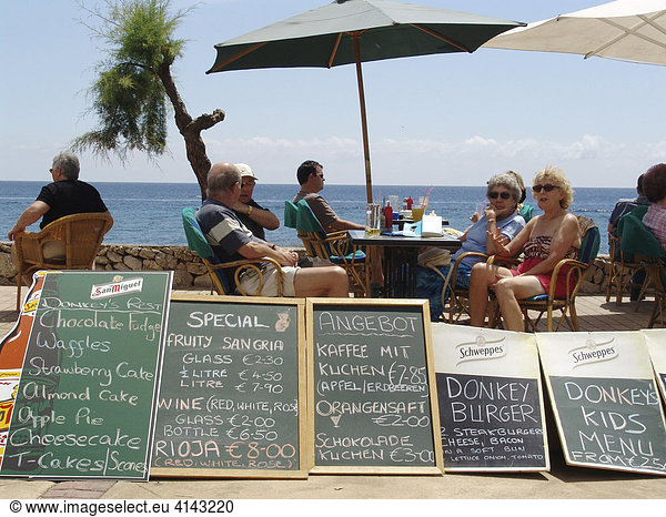 ESP  Spain  Balearic Islands  Mallorca : Tourist menue in different languages at a tourist restaurant.