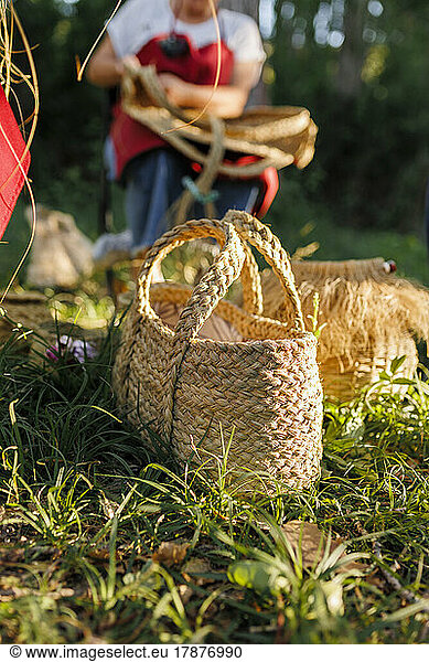 Esparto grass bag on grass at sunny day