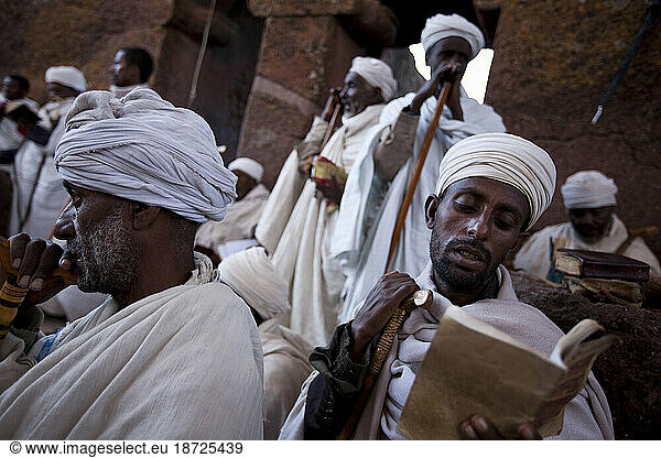 Ethiopian Orthodox Christian priests read the bible and pray together at Bet Mariam  Lalibela  Northern Ethiopia.