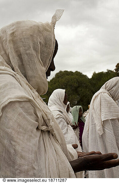 Ethiopian Orthodox Christian women pray in the courtyard of St. Mary of Zion church in the days leading up to Easter  Aksum  Northern Ethiopia.