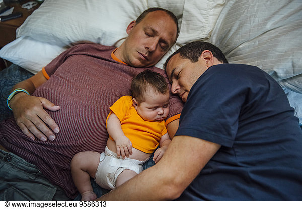 Europäer Junge - Person Menschlicher Vater Bett schlafen Baby