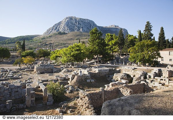 Europe  Greece  Peloponnese  ancient Corinth  archaeological site and the mountain with the acropolis of Acrocorinth.