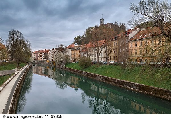 Europe  Slovenia  Ljubljana. Buildings on the Ljubljanica river in early spring.