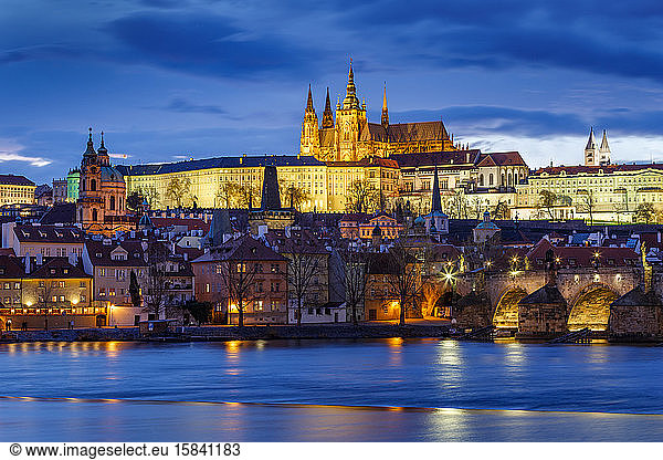 Evening view of Prague Castle over river Vltava.