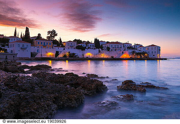 Evening view of Spetses village from the beach  Greece.