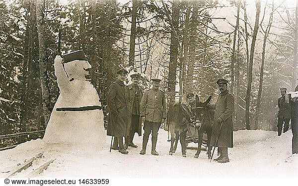 events  First World War / WWI  Western Front  1915 - 1918  German soldiers with a snowman  probably in the Vosges Mountains near Colmar  early 1915  Alsace-Lorraine  Alsace  officers  snow  winter  donkey  donkeys  1910s  10s  20th century  historic  historical  military  German Reich  Empire  Germany  France  uniform  uniforms  people