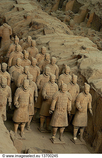Excavated tomb of terracotta warriors  Xi'an  China. A full army of terracotta warriors were created to guard the tomb of Quin Shi Huang  the first emperor of China  who died in 210 BC. It was discovered by farmers digging a well in 1974. This is a view of pit #1. It is now a World Heritage site.