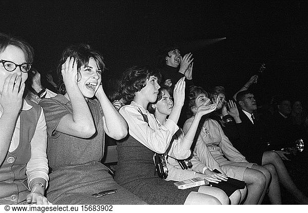 Excited Fans Reacting to The Beatles British Rock and Roll Performing  Washington Coliseum  Washington  D.C.  USA  photograph by Marion S. Trikosko  February 11  1964