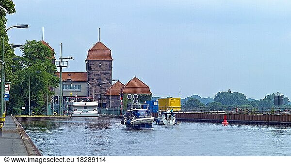 Excursion boat and pleasure boats in front of the shaft lock  Minden  Germany  Europe