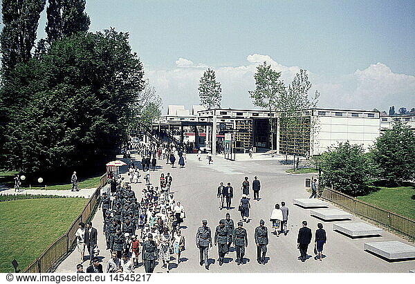 exhibitions  country exhibitions  Switzerland  Swiss national exhibition  exposition nationale suisse de 1964 (Expo64)  30.4.1964 - 25.10.1964  sector  les communications et les transports  (communication and transport)  Lausanne  summer of 1964  Expo  visitors  visitor  soldiers  military  architecture  futuristic  1960s  60s  20th century  historic  historical  people