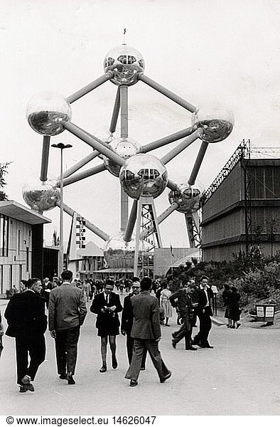 exhibitions  world exposition  Brussels  Expo '58  visitors in front of the Atomium  designed by Andre Waterkeyn  grounds  1958  58  1950s  50s  20th century  historic  historical  Europe  exhibitions  exhibition  World Fair  international  monument  symbol  symbolic  building  architecture  architect  atom  atomic age  historic  historical  1950s  50s  passers-by  walkers  pedestrians  people