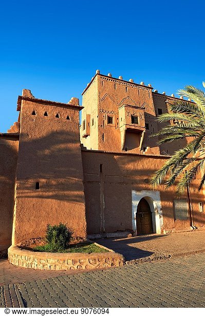 Exterior of the mud brick Kasbah of Taourirt  Ouarzazate  Morocco  built by Pasha Glaoui. A Unesco World Heritage Site.