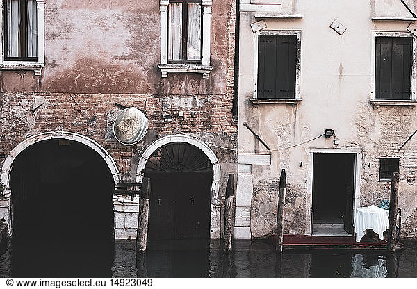 Exterior view of a neglected building on the Canale Grande in Venice  Veneto  Italy.