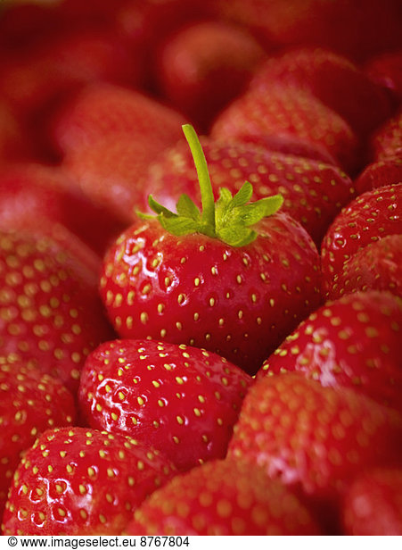 Extreme close up of ripe strawberries