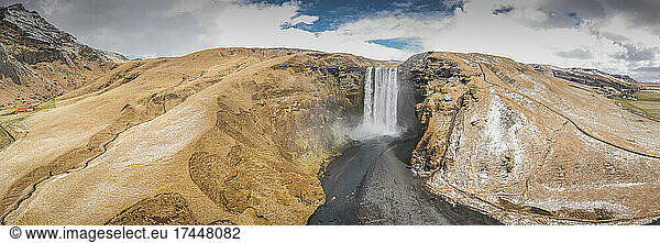 extreme waterfall from aerial view in spring in panoramic view