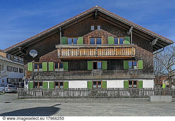 Facade with wooden shingles and green shutters  Oy  Allgäu  Bavaria  Germany  Europe