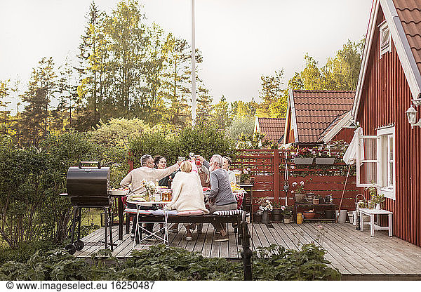Family having meal in garden