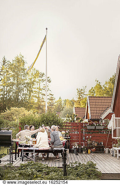Family having meal in garden