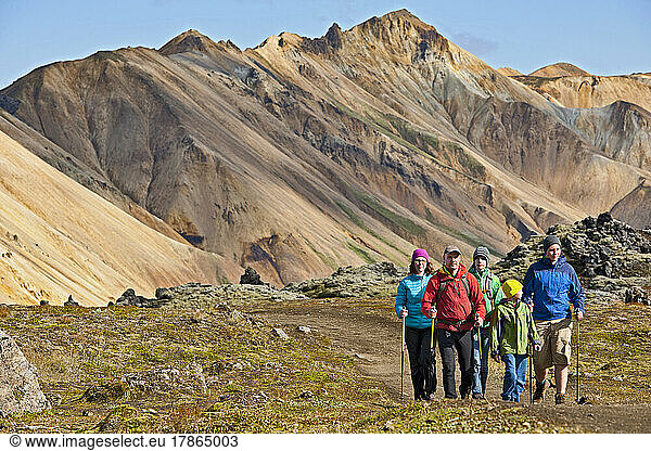 family hiking in Landmannalaugar - a geothermal area in Iceland