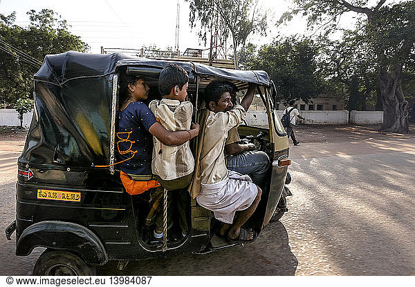 Family in Auto Rickshaw in India