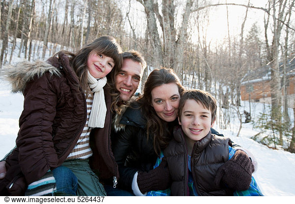 Family in snow  portrait