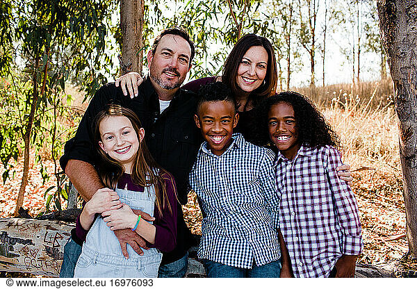 Family of Five Smiling for Camera at Park in Chula Vista