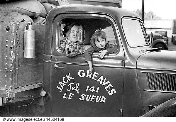 Family of Trucker Waiting while Truck is Being Loaded  Minneapolis  Minnesota  USA  John Vachon for U.S. Resettlement Administration  September 1939