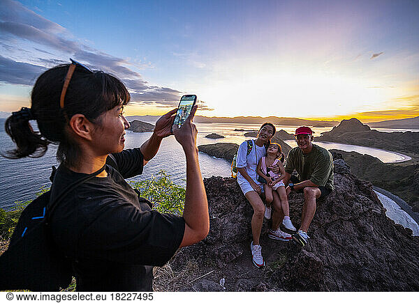 Family posing for photo at east Nusa Tenggara island in Komodo