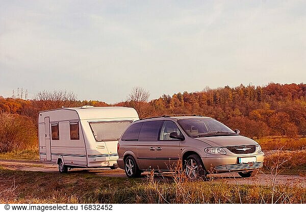 Family vacation travel  holiday trip in motorhome  Caravan car Vacation. Car with caravan ready for long jorney.