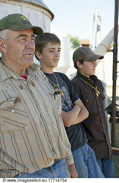 Farmer And His Grandsons. Munson Alberta