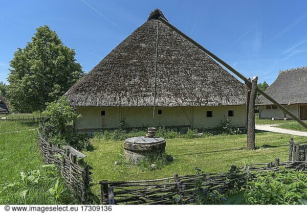 Farmhouse built around 1367  draw well in the farm garden  Franconian Open Air Museum  Bad Windsheim  Middle Franconia  Bavaria  Germany  Europe