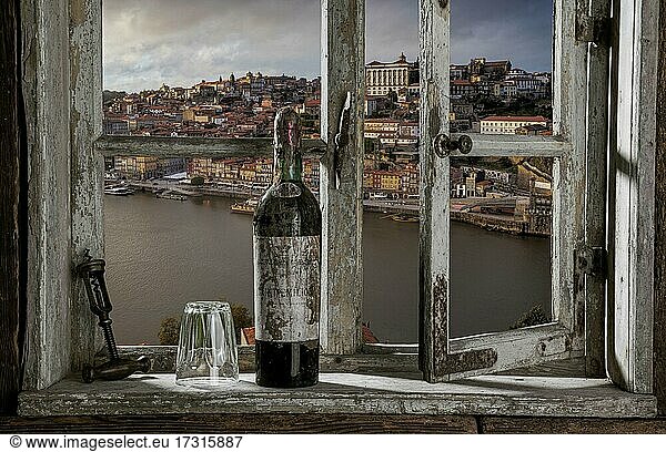Farmhouse  old bottle of red wine  glass  corkscrew  view from open window to Porto  composing  Portugal  Europe
