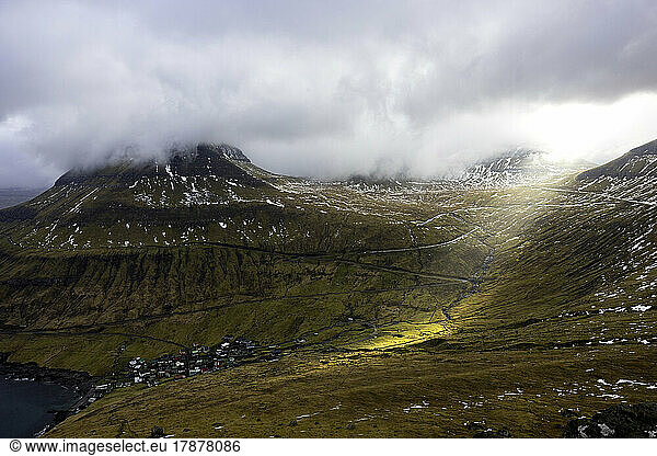 Faroe Islands  Eysturoy  Funningur  Low clouds hanging over remote fishing village