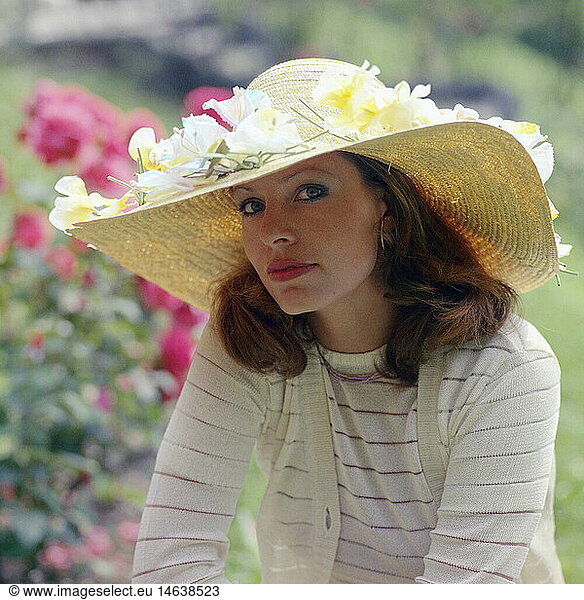 fashion  ladies' fashion  headpiece  woman with straw hat  1975