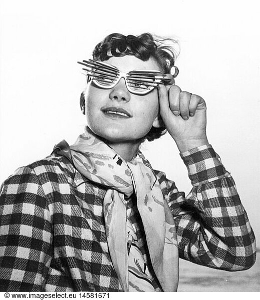 fashion  1950s  accessories  young woman with fancy sunglasses  1952