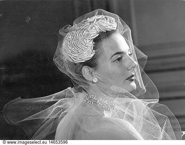 fashion  1950s  hats  hat for the evening with veil by 'Gilbert Orcel'  1952