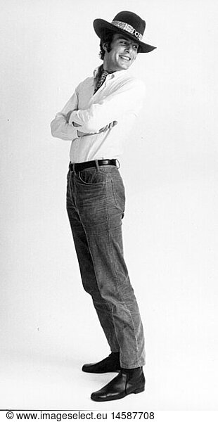 fashion  1970s  model with hat  shirt and cord trousers  circa 1970