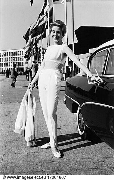 Fashion / 1960s. Presentation of ladies’ fashion at the FFM (Frankfurter Spring fair)  1960: mannequin in a pantsuit with blouson. Photo.