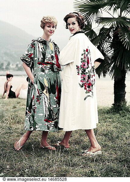 fashion  1960s  two women wearing colorful terry cloth  dressing gown