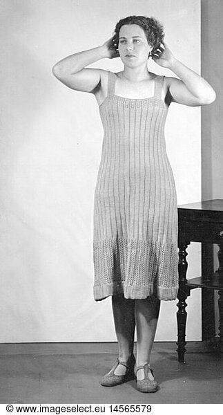 fashion  1930s  woman with knitted dress  circa 1930