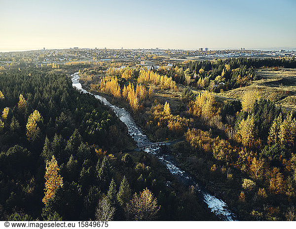 Fast river through autumn countryside