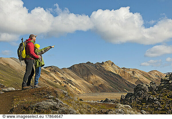 father and son hiking in Landmannalaugar / Iceland