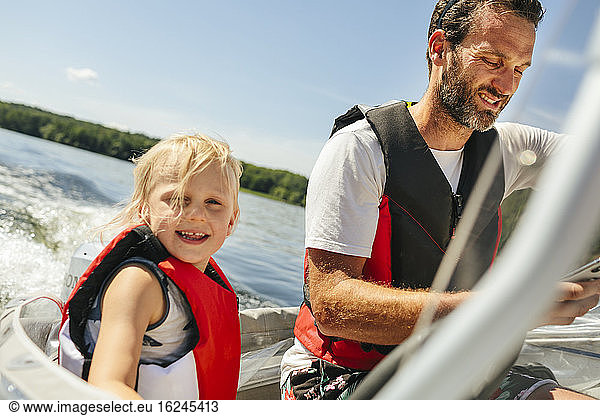 Father with daughter on boat